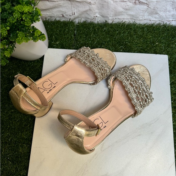 AGL
Crochet Penny Block Heel Sandal in Golden Platino color size 36.5 US 6.5 - Picture 10 of 14
